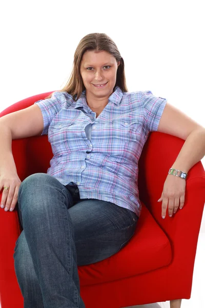 Girl on armchair — Stock Photo, Image