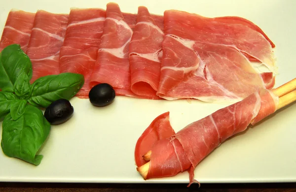 Grissini with ham — Stock Photo, Image