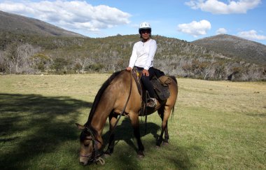 Horse Riders in the Outback clipart