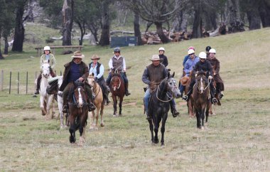 Group of Horse Riders in the Outback clipart