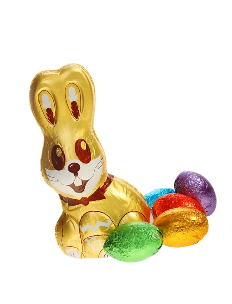 Golden chocolate Easter bunny with eggs — Stock Photo, Image