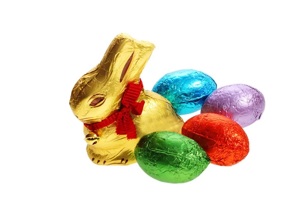 Golden chocolate Easter bunny with egg — Stock Photo, Image