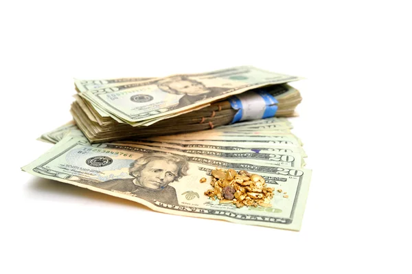 Contant geld en goud nugget — Stockfoto