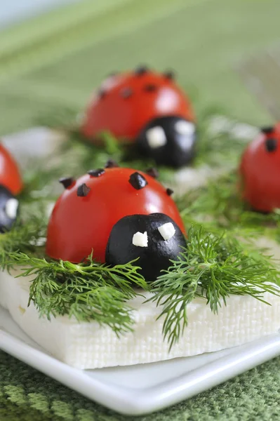 stock image Ladybug tomato and olive with cheese