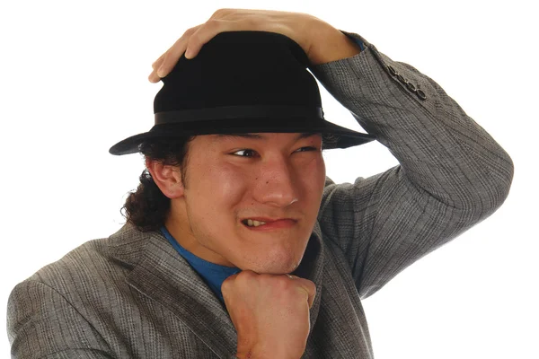 Азиатский мужчина в шляпе портрет юмора — стоковое фото