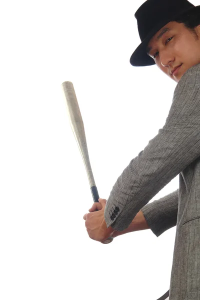 Asian man in hat with baseball bat — Stock Photo, Image
