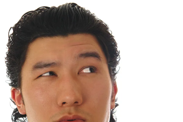 Del av asiatiska man ansiktet med känslor — Stockfoto