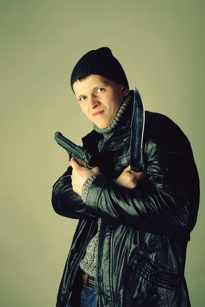Gangman with knife and gun — Stock Photo, Image
