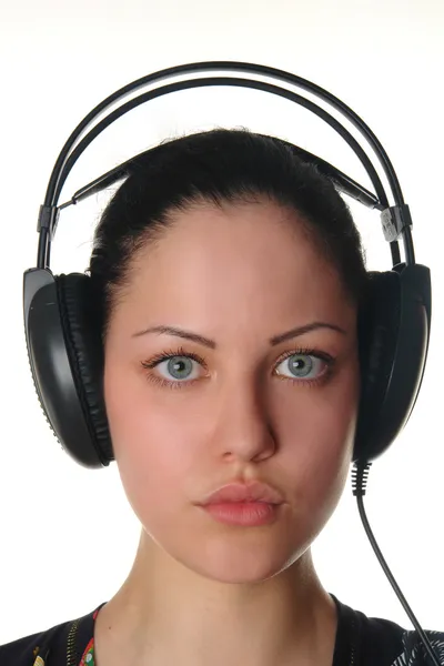 Kobieta z słuchawki portret — Zdjęcie stockowe