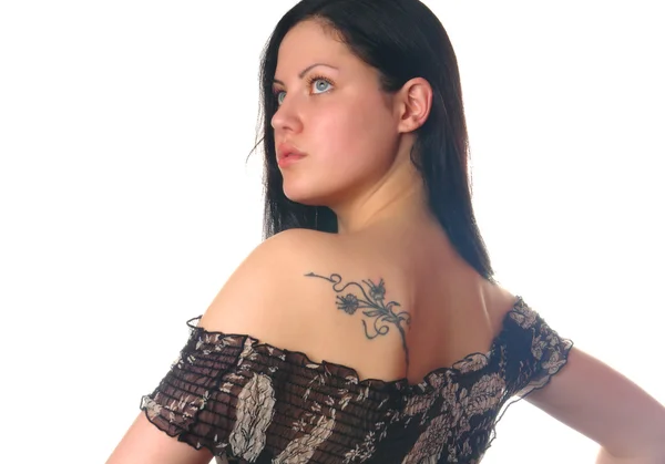 Mladá žena s tetování portrétu — Stock fotografie