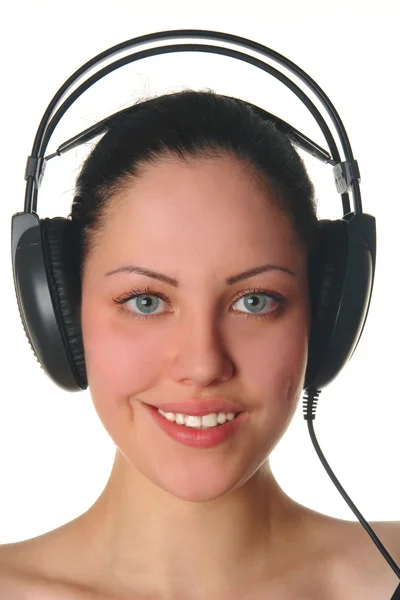 Mulher sorridente com fones de ouvido retrato — Fotografia de Stock