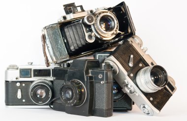 OLD CAMERAS PYRAMID ON A WHITE clipart