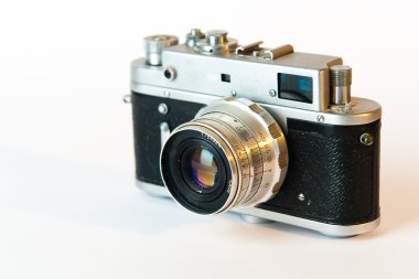 Old photo camera isolated on a white clipart