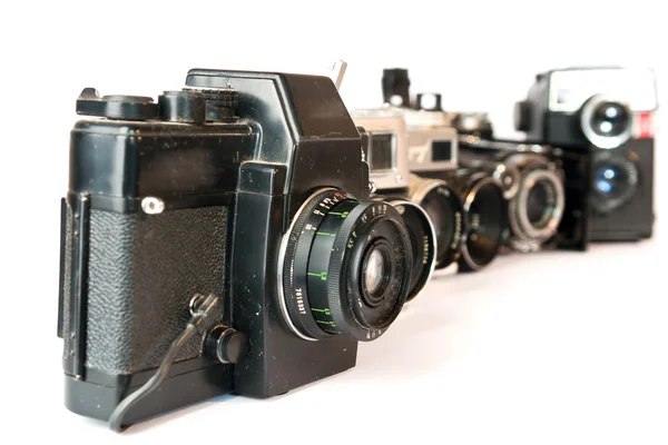 Izolované staré fotoaparáty na bílé — Stock fotografie