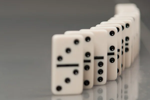 Domino em um bg cinza — Fotografia de Stock