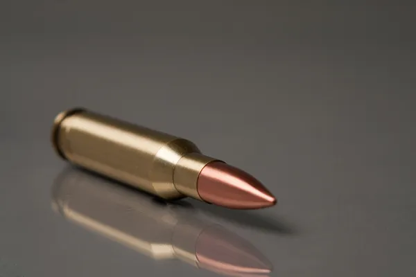 Zbraň bullet lež — Stock fotografie