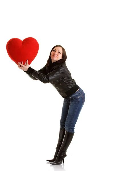 Rockergirl с красной подушкой сердца — стоковое фото