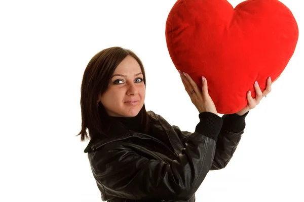 Rockergirl с красной подушкой сердца — стоковое фото