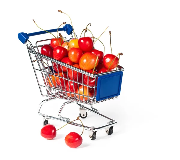 Metal shopping trolley filled with cherry — Stock Photo, Image