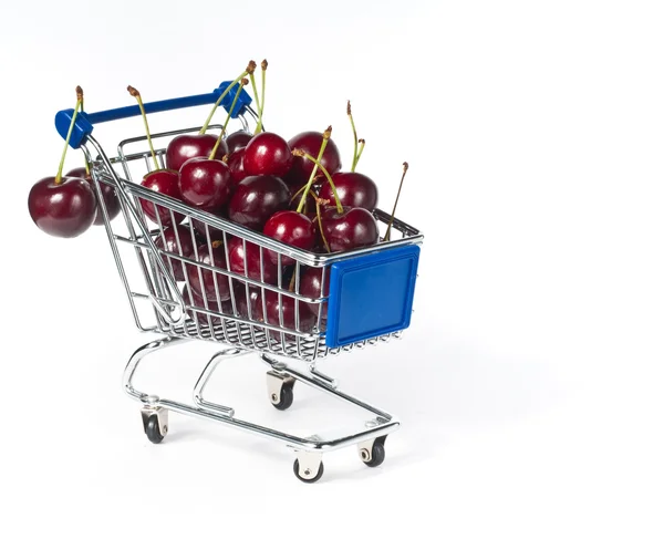 Metal shopping trolley filled with raspberry — Stock Photo, Image