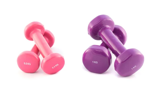 Lila és rózsaszín súlyzók Stock Kép