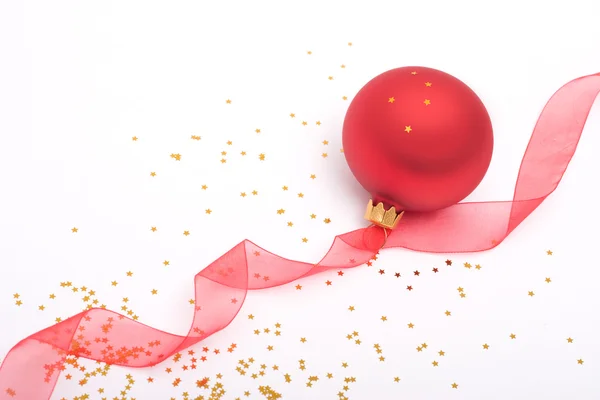 Red Christmas bauble and soft ribbon — Stock Photo, Image