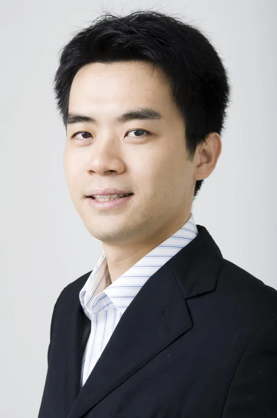 Smiling asian businessman — Stock Photo, Image