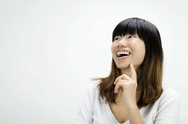 Asian girl having a thought — Stock Photo, Image