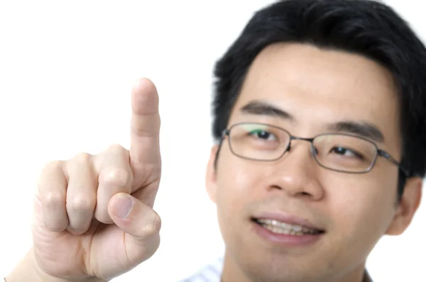 Asian business man pressing on a blank space — Stock Photo, Image
