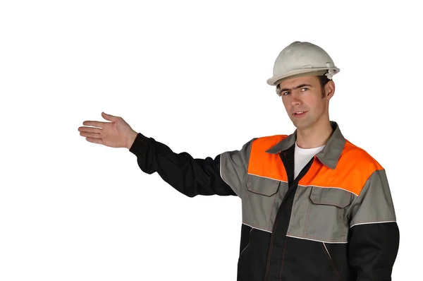 Jeune constructeur, pointant du doigt le travail accompli Image En Vente