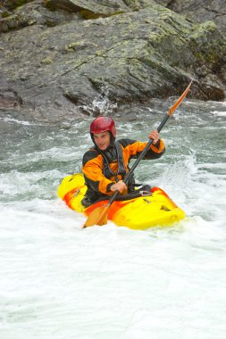 Kayaking in Norway clipart