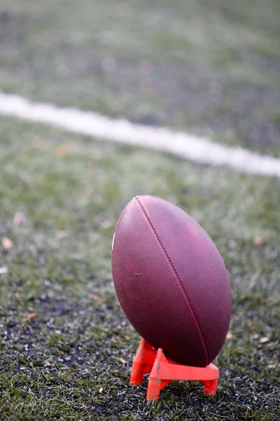 American football on tee — Stock Photo, Image