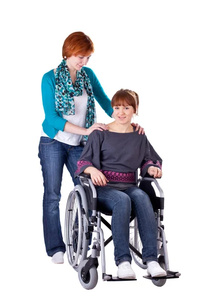 Två tjejer en på rullstol — Stockfoto