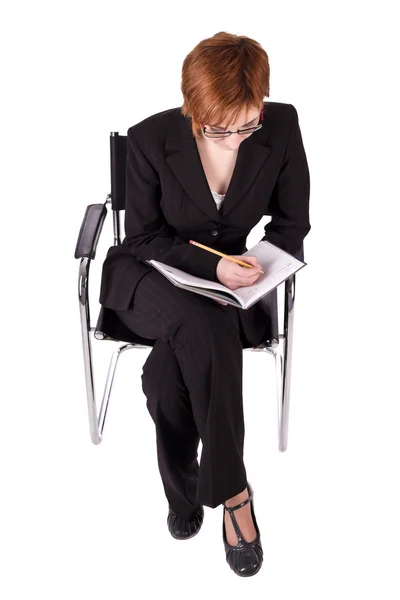 Businesswoman makes note — Stock Photo, Image