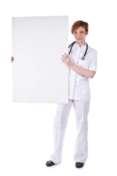 Médico joven con pizarra blanca en blanco —  Fotos de Stock