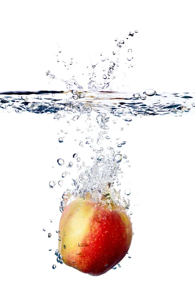 Apfelspritzer im Wasser — Stockfoto