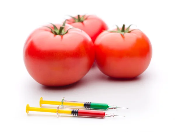 Syringe Red nad Green Liquid with Tomatoes — Stock Photo, Image