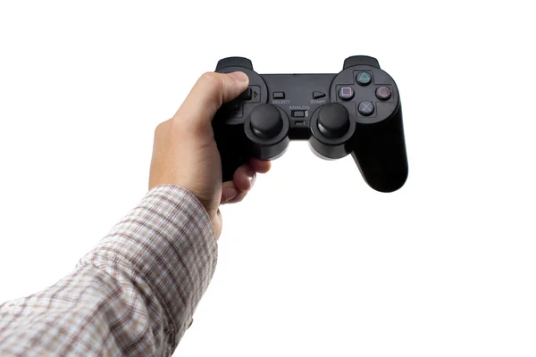 Человеческие руки, держащие игровой контроллер на белом фоне — стоковое фото