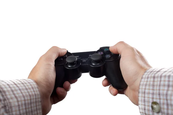Ludzkie ręce, trzymając kontrolera gier na białym tle — Zdjęcie stockowe