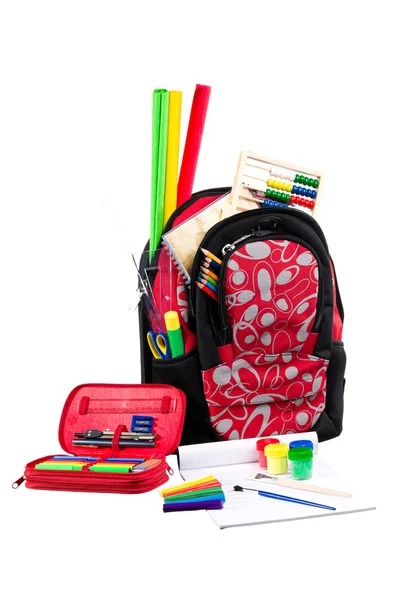 Packback preto e vermelho com material escolar — Fotografia de Stock