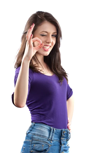 Mujer joven haciendo señal OK —  Fotos de Stock