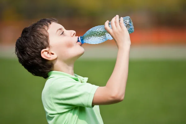 Child drinking water Stock Picture