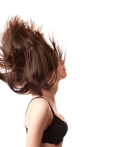 Jovem senhora lançando seu cabelo — Fotografia de Stock