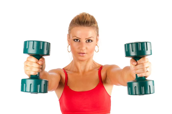 Kvinnan gör gym med vikter — Stockfoto