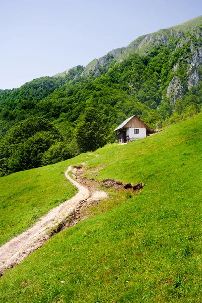 Old house in mountains — Stock Photo, Image