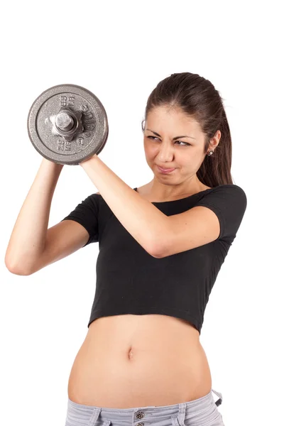 Morena fazendo fitness com pesos — Fotografia de Stock