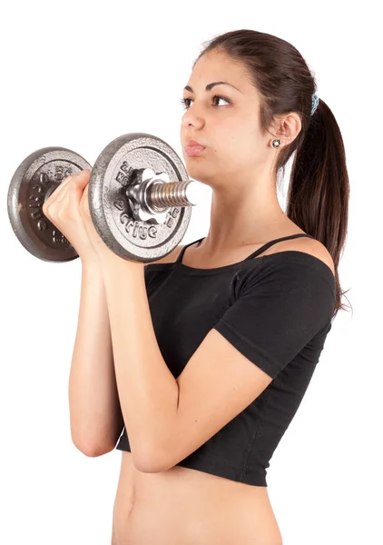 Brunette doen fitness met gewichten — Stockfoto
