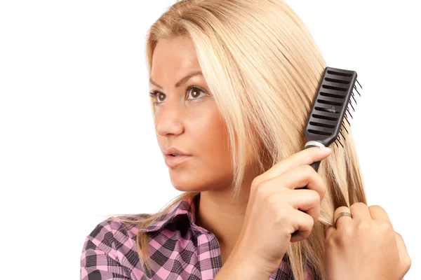 Kadın saçları fırçalama — Stok fotoğraf