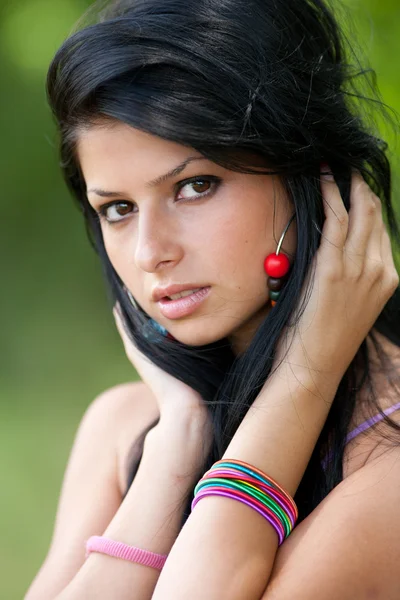 Beautiful brunette young lady outdoor — Stock Photo, Image