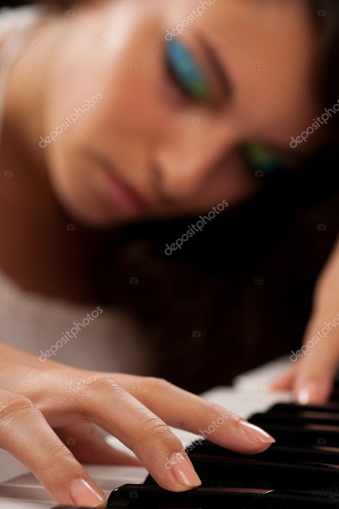 Beautiful lady piano player — Stock Photo © Xalanx #3616709